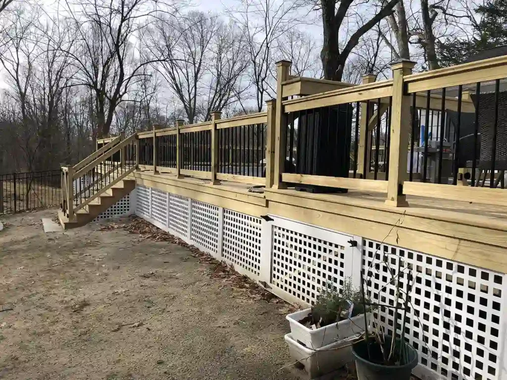 Custom carpentry of large porch on back of suburban home